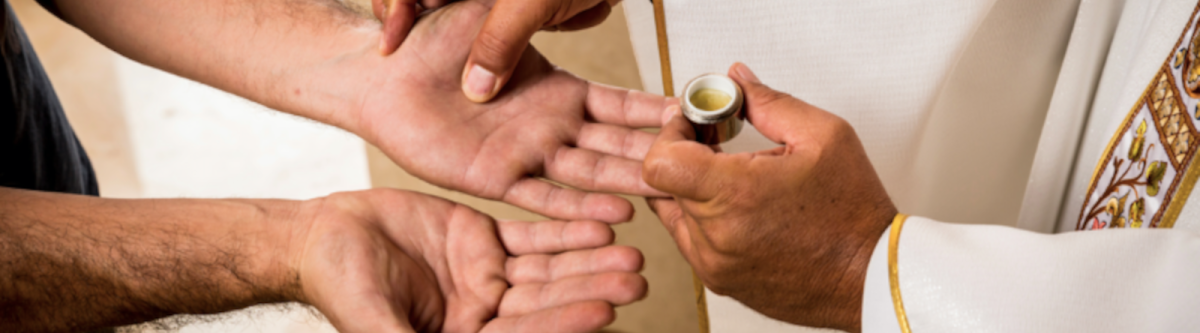 hands receiving anointing