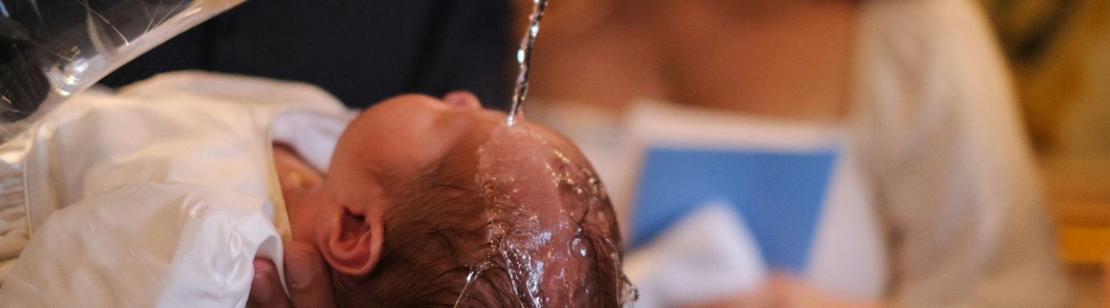 baby being baptized