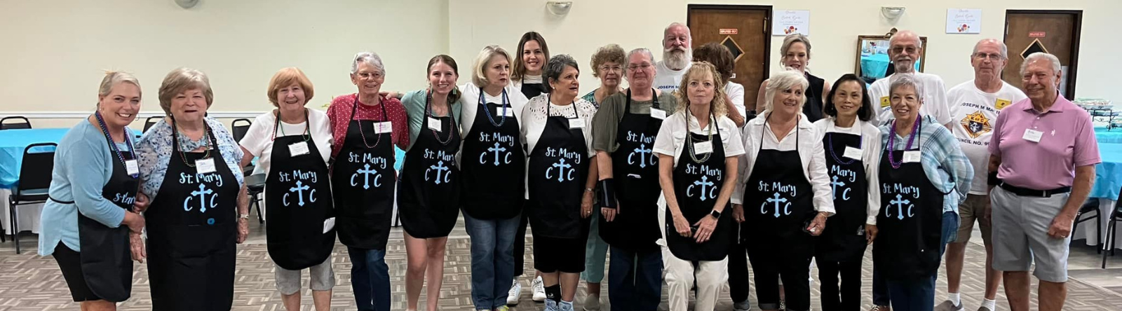 people standing in a group smiling