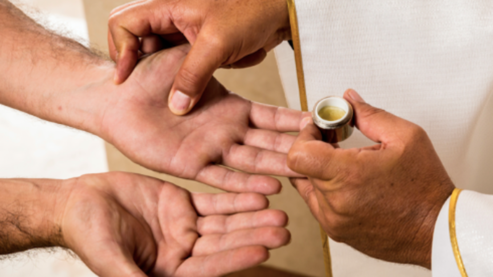 hands receiving anointing