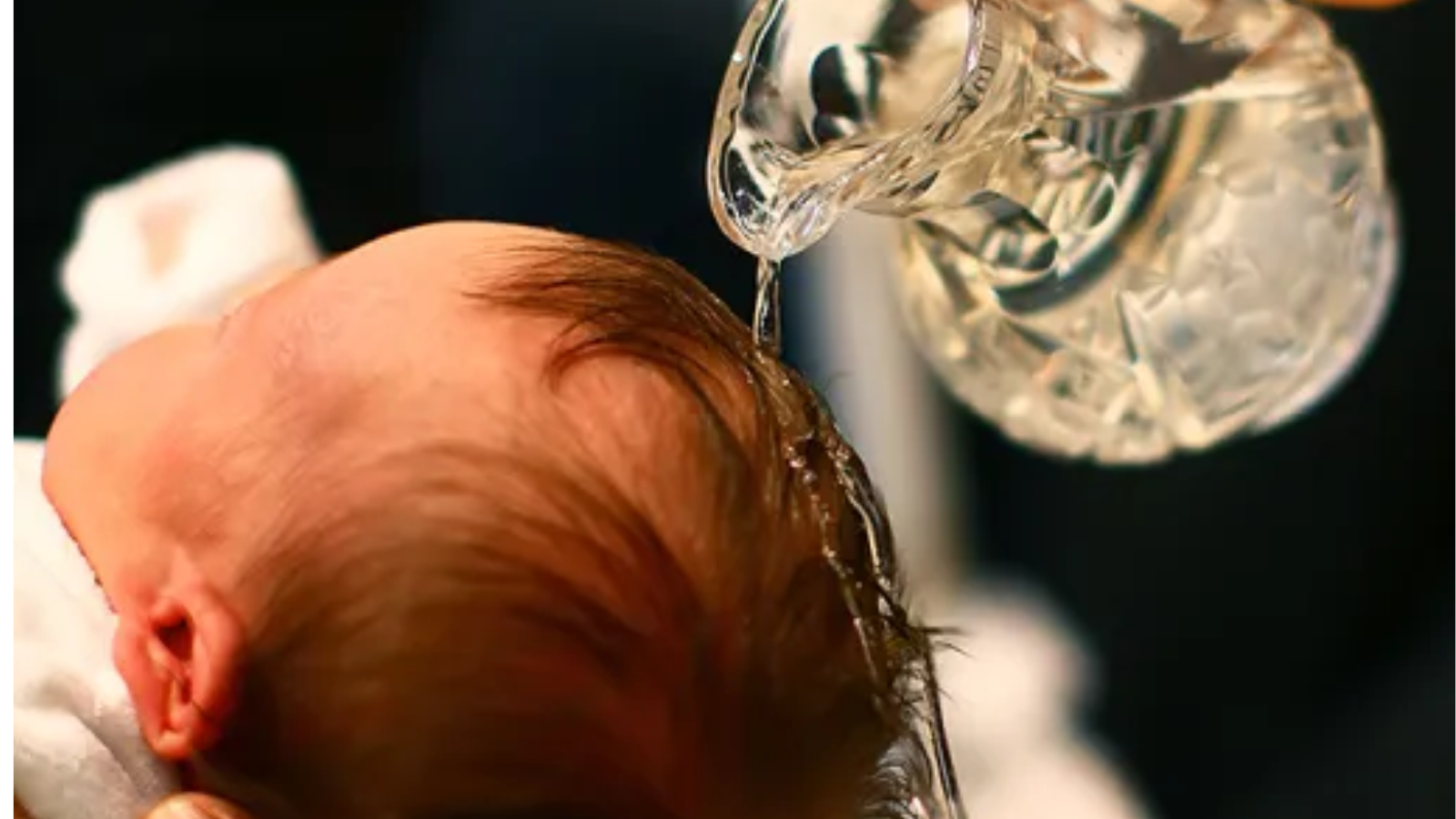 baby being baptized